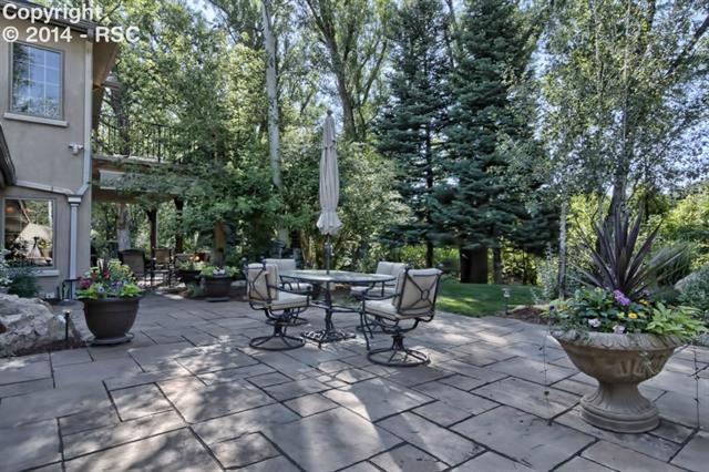 603 West Cheyenne Road Colorado Springs, CO 80906 - Photo 23 of 25 This location affords relaxing recreation and generous entertaining areas , listen to sounds of flowing water from Cheyenne Creek as you enjoy the expansive outdoor living spaces....Well to irrigate the property