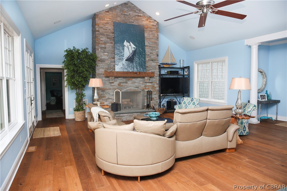 1000 Queenstown Road Lancaster, VA 22503 - Photo 31 of 49 a living room with furniture and a fireplace