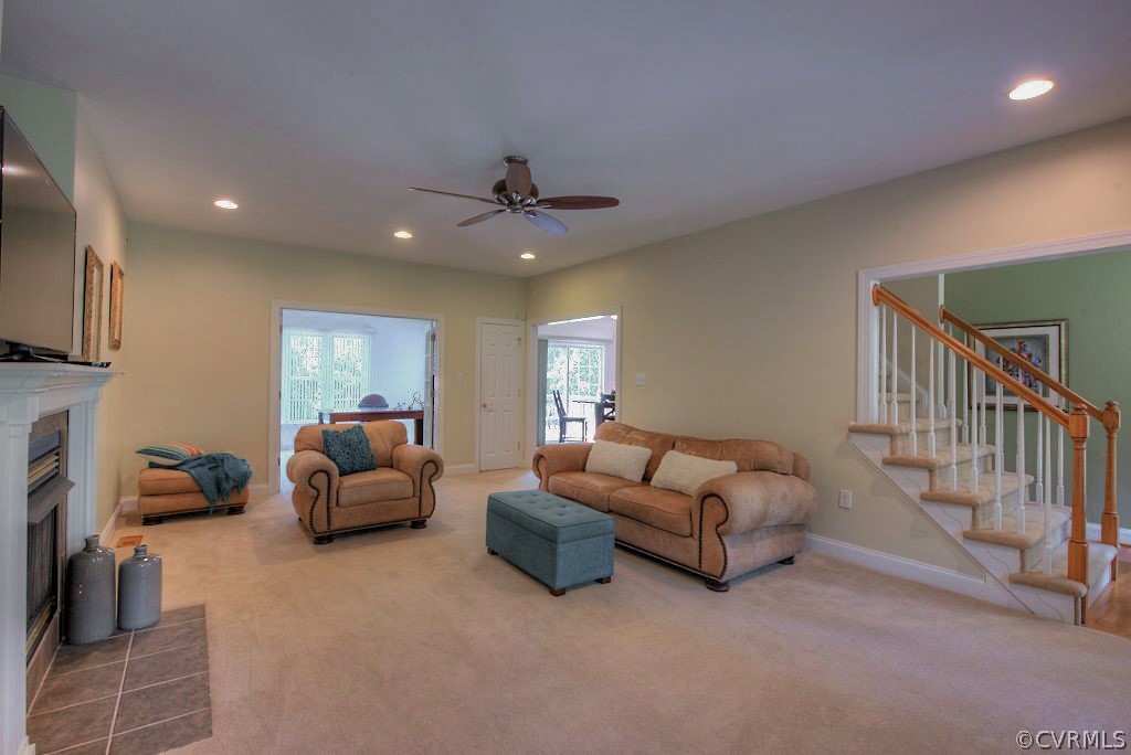 13340 Eppes Falls Road Chesterfield, VA 23838 - Photo 11 of 50 a living room with furniture and a flat screen tv