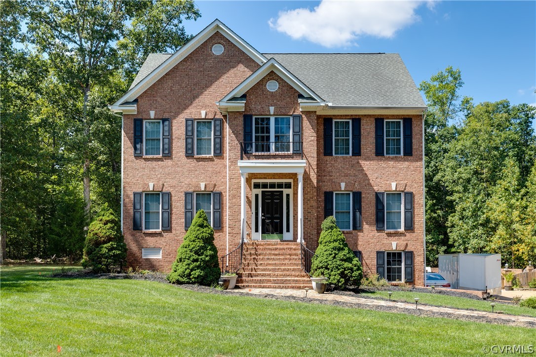 13340 Eppes Falls Road Chesterfield, VA 23838 - Photo 2 of 50 front view of a house with a yard