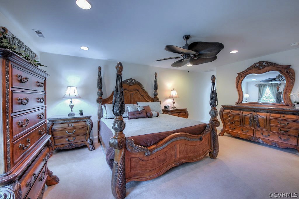 13340 Eppes Falls Road Chesterfield, VA 23838 - Photo 28 of 50 a bedroom with furniture and a ceiling fan