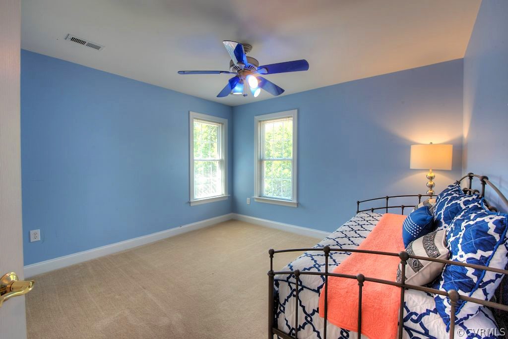 13340 Eppes Falls Road Chesterfield, VA 23838 - Photo 33 of 50 a living room with furniture and a chandelier