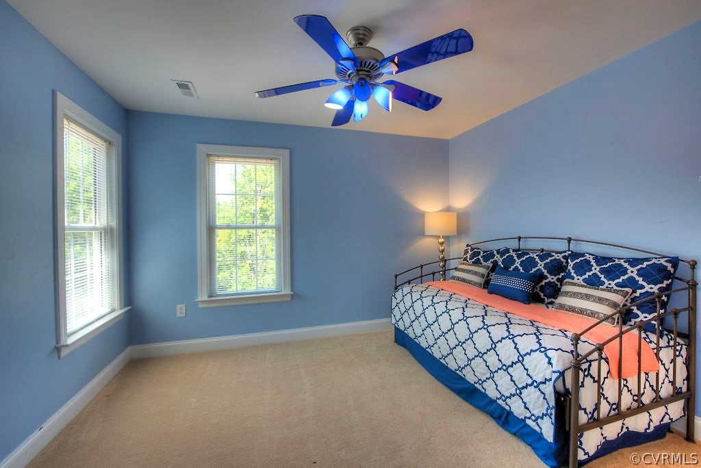 13340 Eppes Falls Road Chesterfield, VA 23838 - Photo 34 of 50 a bedroom with a bed and window