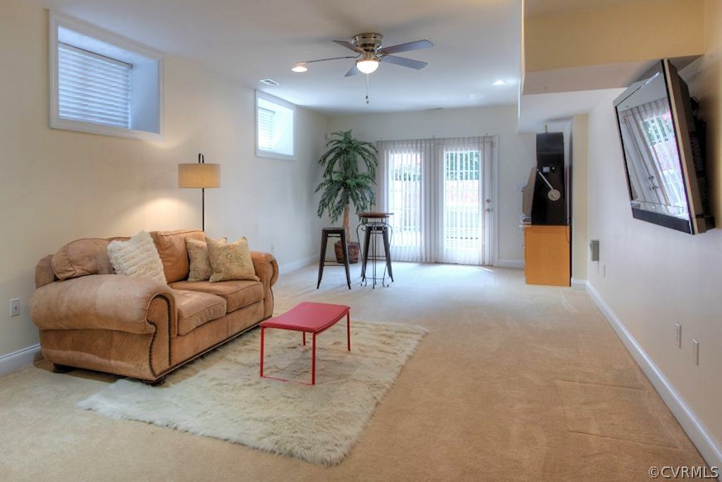 13340 Eppes Falls Road Chesterfield, VA 23838 - Photo 40 of 50 a living room with furniture and a chandelier
