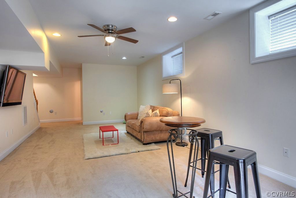 13340 Eppes Falls Road Chesterfield, VA 23838 - Photo 41 of 50 a living room with furniture and a table