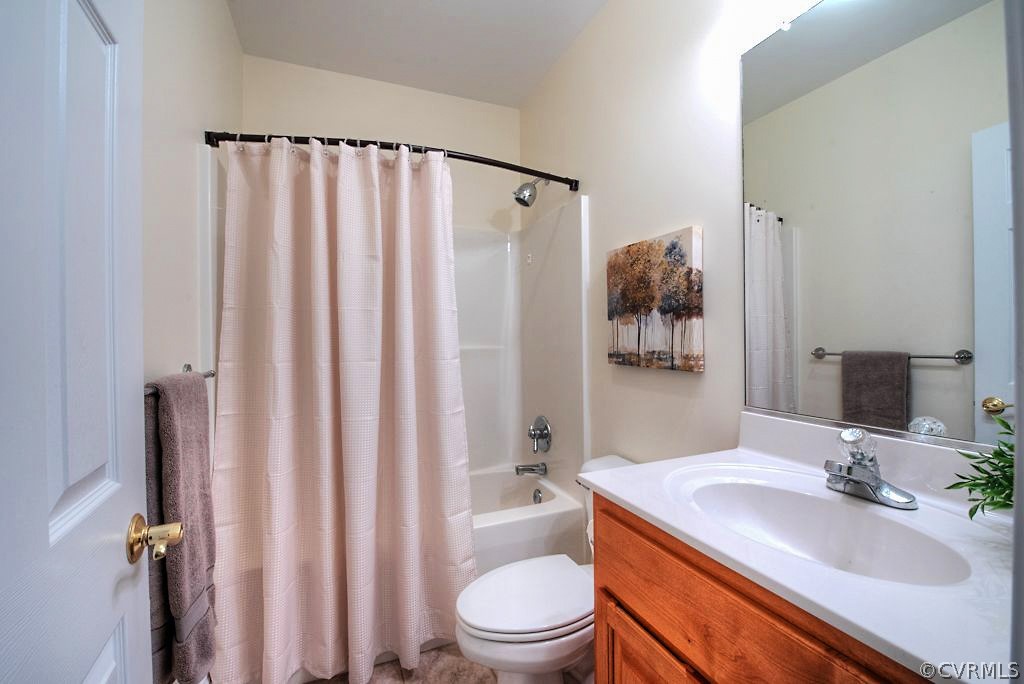 13340 Eppes Falls Road Chesterfield, VA 23838 - Photo 43 of 50 a bathroom with a sink toilet and shower