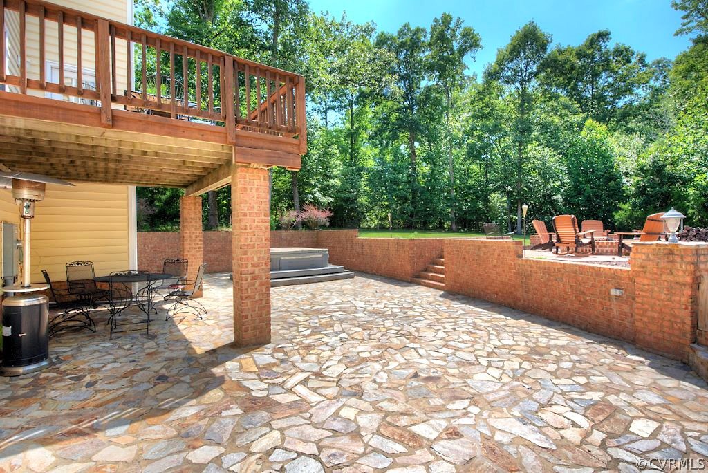 13340 Eppes Falls Road Chesterfield, VA 23838 - Photo 45 of 50 a backyard of a house with table and chairs