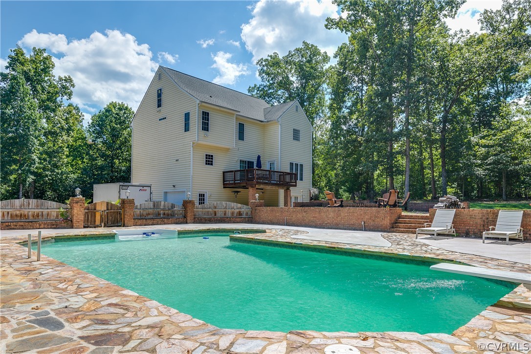 13340 Eppes Falls Road Chesterfield, VA 23838 - Photo 5 of 50 a front view of a house with garden and sitting area