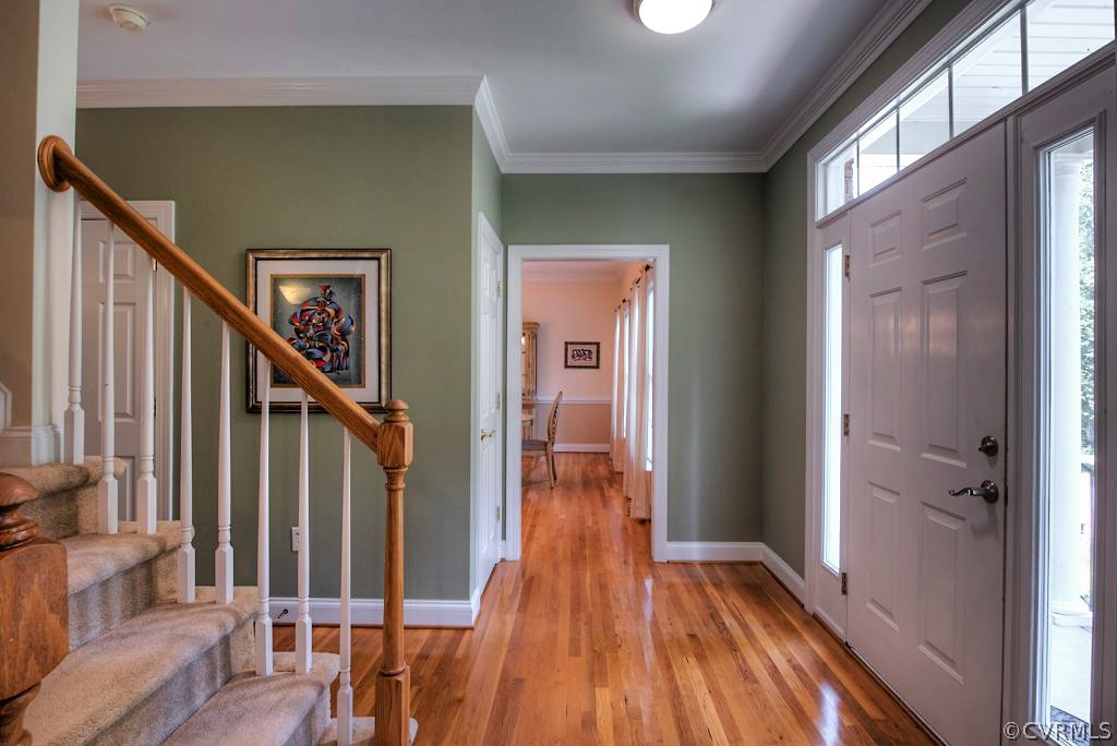 13340 Eppes Falls Road Chesterfield, VA 23838 - Photo 7 of 50 a view of a hallway with wooden floor and staircase