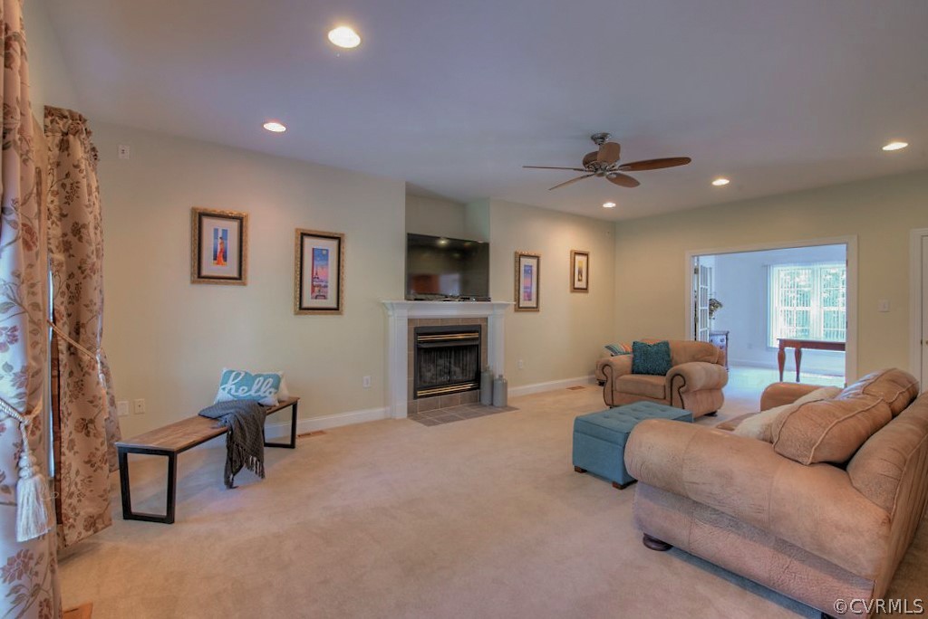 13340 Eppes Falls Road Chesterfield, VA 23838 - Photo 9 of 50 a living room with furniture and a fireplace