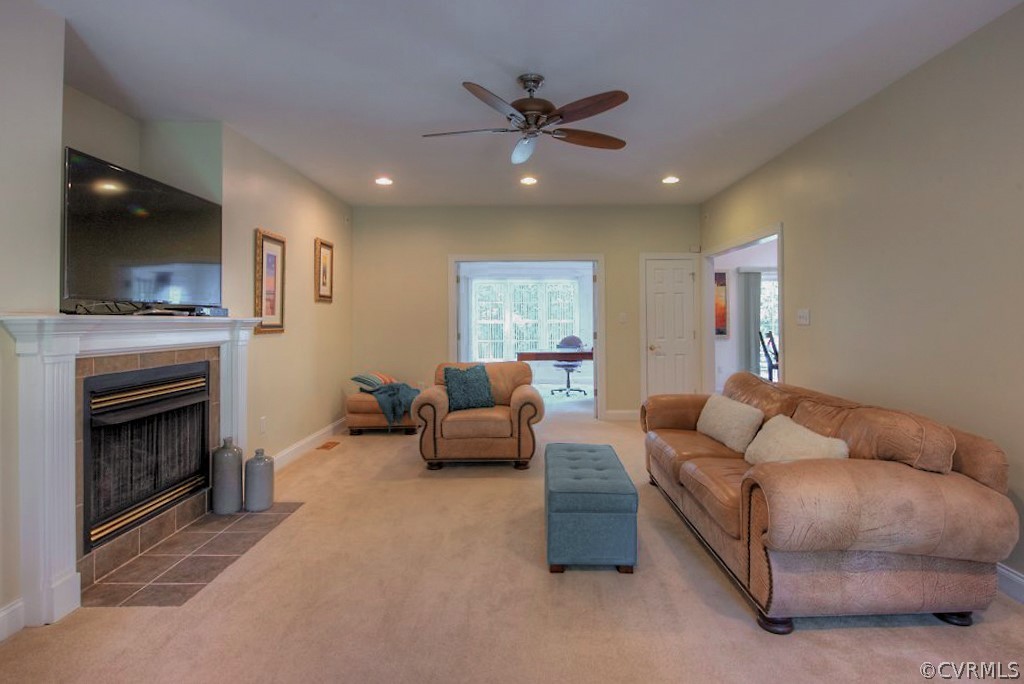13340 Eppes Falls Road Chesterfield, VA 23838 - Photo 10 of 50 a living room with furniture and a fireplace