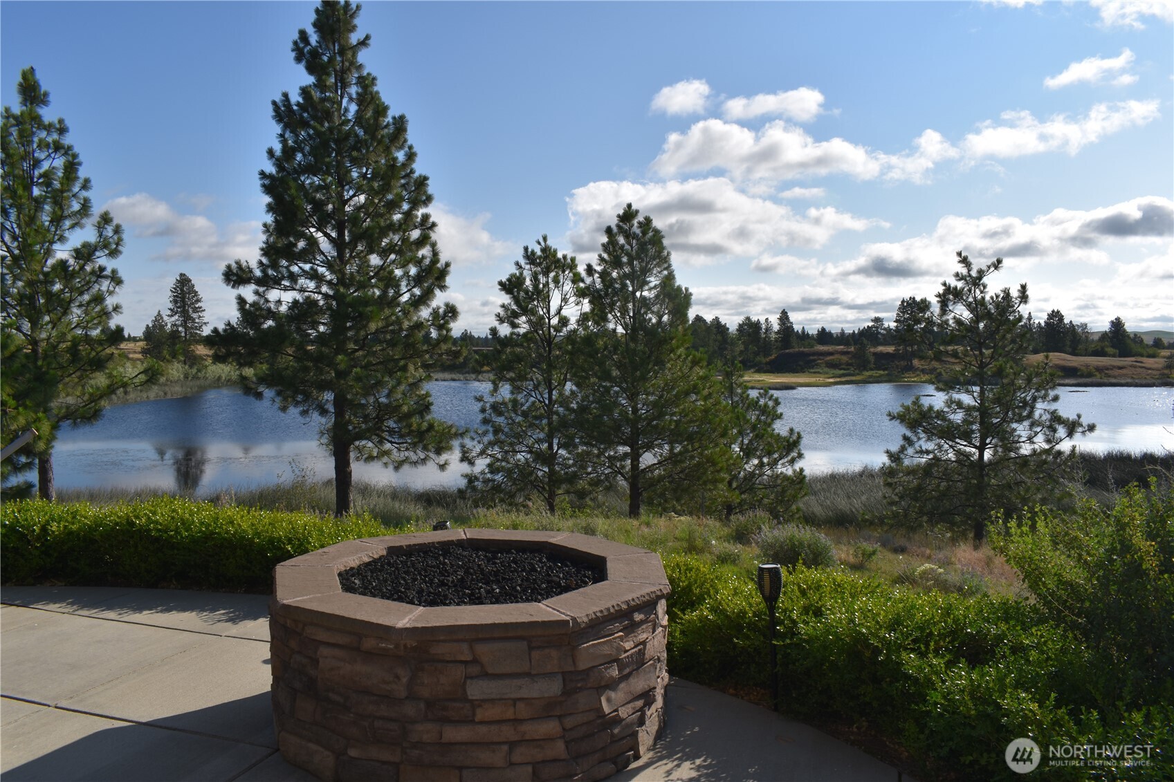37227 South Long Road Cheney, WA 99004 - Photo 15 of 40 a view of a back yard of the house and green space