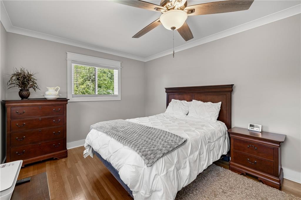 6470 Samoa Way Flowery Branch, GA 30542 - Photo 43 of 61 a bedroom with bed and window