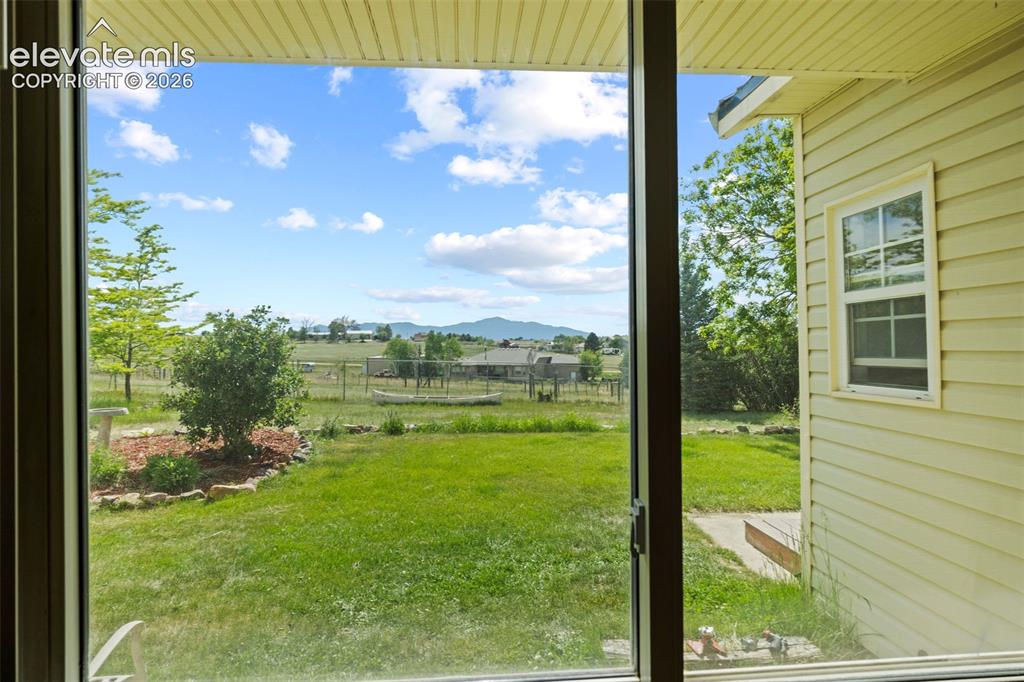 13075 Blaney Road South Peyton, CO 80831 - Photo 6 of 40 View of Pikes Peak from living room window