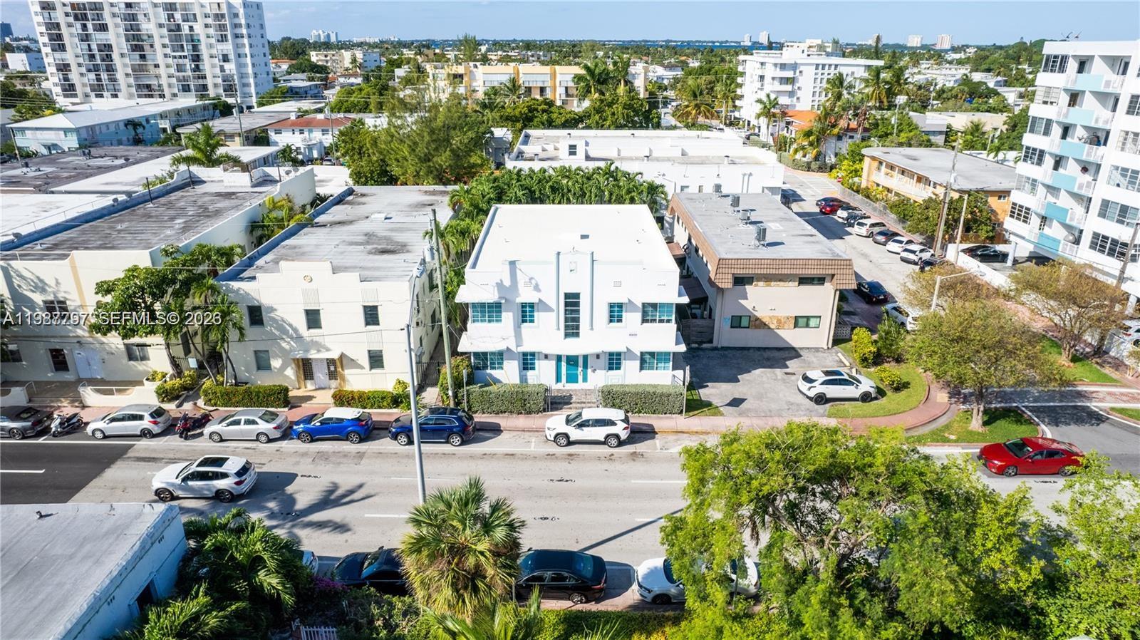 7936 Harding Avenue, Unit 5 Miami Beach, FL 33141 - Photo 4 of 6 an aerial view of multiple houses with yard