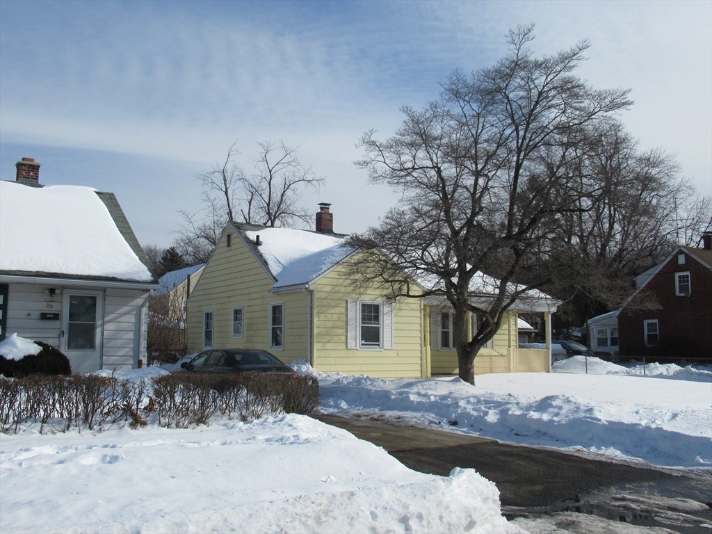 33 Connolly Street Springfield, MA 01151 - Photo 11 of 15 a front view of a house with a yard