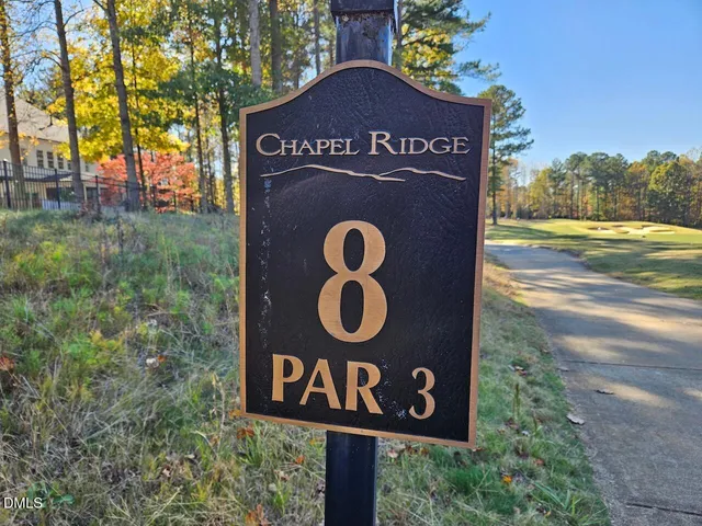 a sign broad on the side of a road