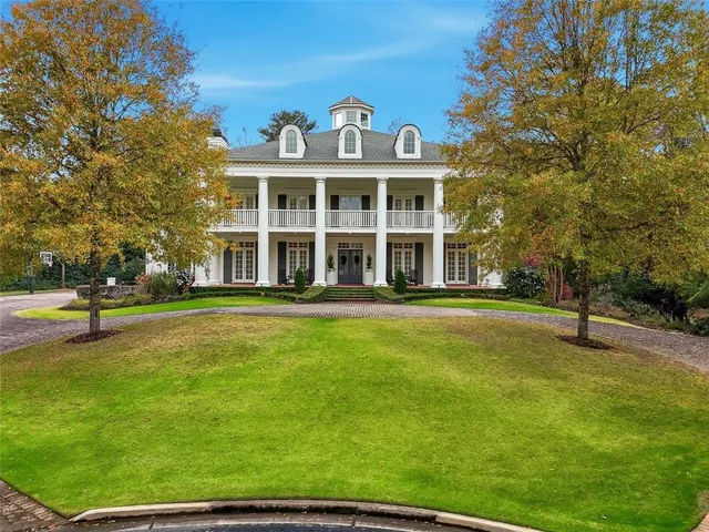 a view of a house with a swimming pool