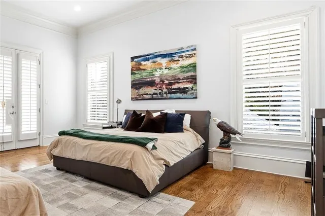 a view of a living room with wooden floor