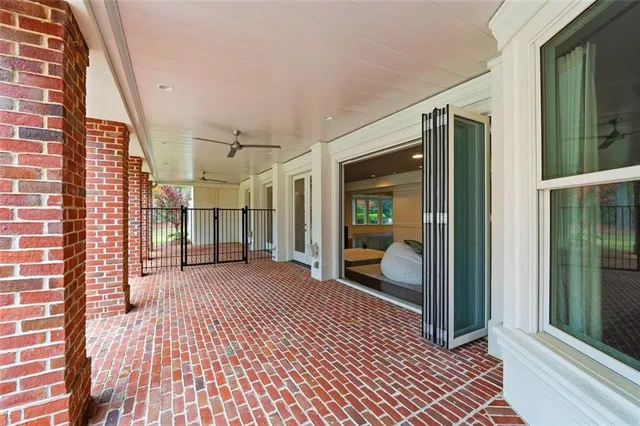 a front view of a building with a swimming pool