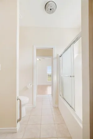 a bathroom with a sink vanity and mirror