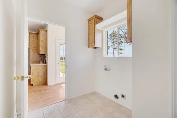 a bed room with a bed and a window