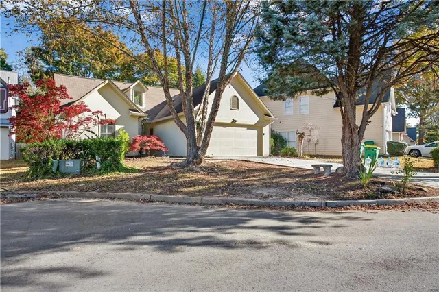 a house with trees in front of it