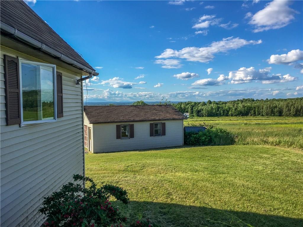 552 Enfield Road Lincoln, ME 04457 - Photo 27 of 35 View from back deck.