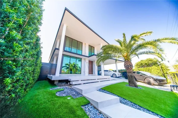 a house view with a garden space