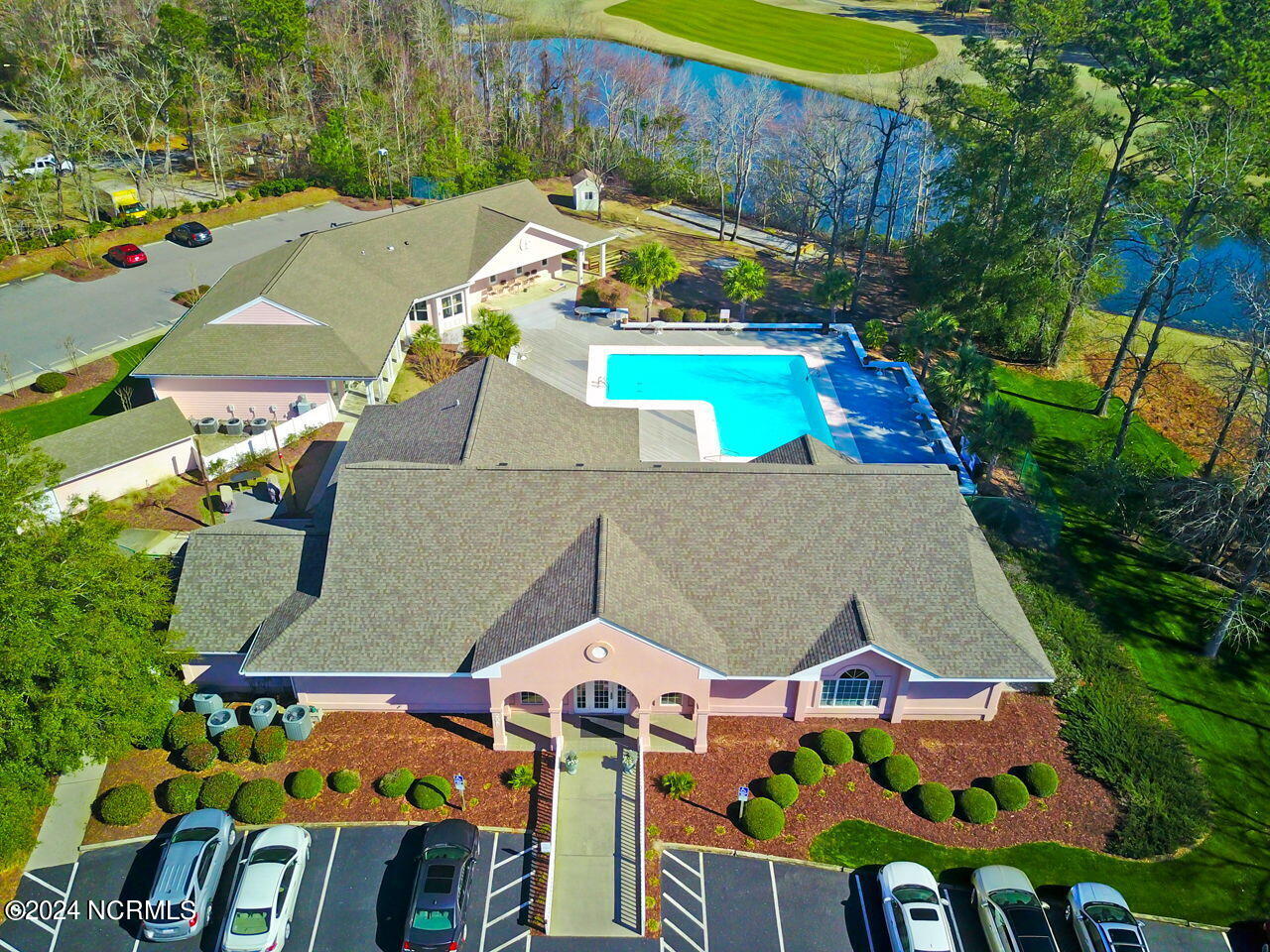 182 Clubhouse Road, Unit 1 Sunset Beach, NC 28468 - Photo 30 of 52 The "Pink Palace", Property owners pool and fitness center.