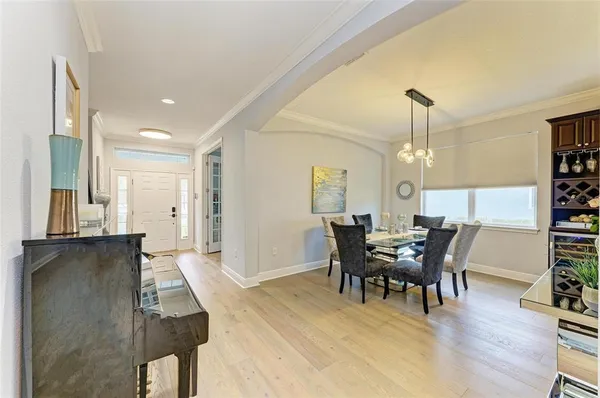 a view of kitchen with stainless steel appliances kitchen island