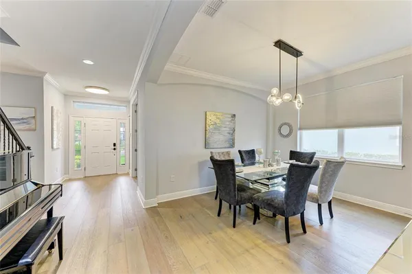 a large kitchen with lots of counter space a sink appliances and cabinets