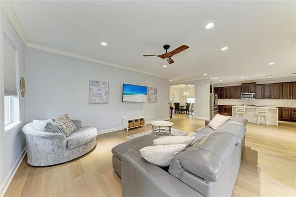a bathroom with a double vanity sink mirror and bathtub