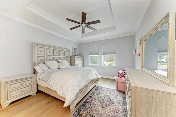 a living room with furniture and a dresser