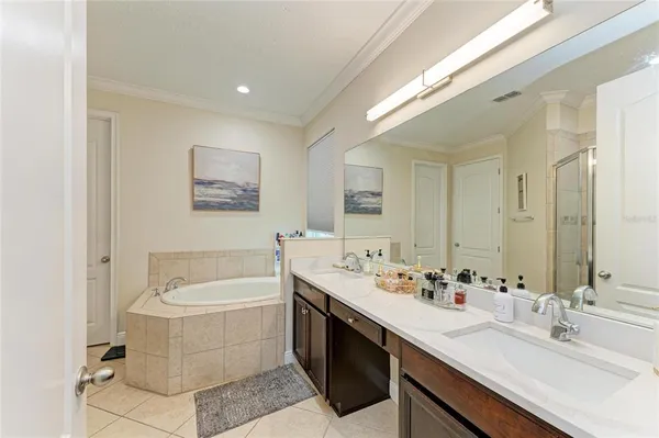 a bathroom with a shower and a curtain