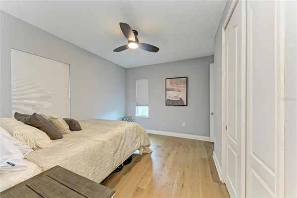 a view of a garden with a house