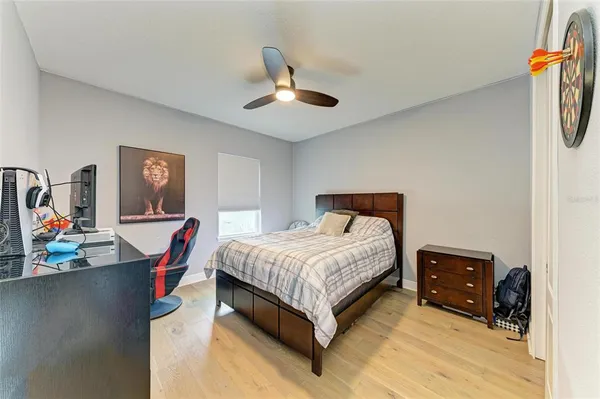 an aerial view of a house with a garden and swimming pool