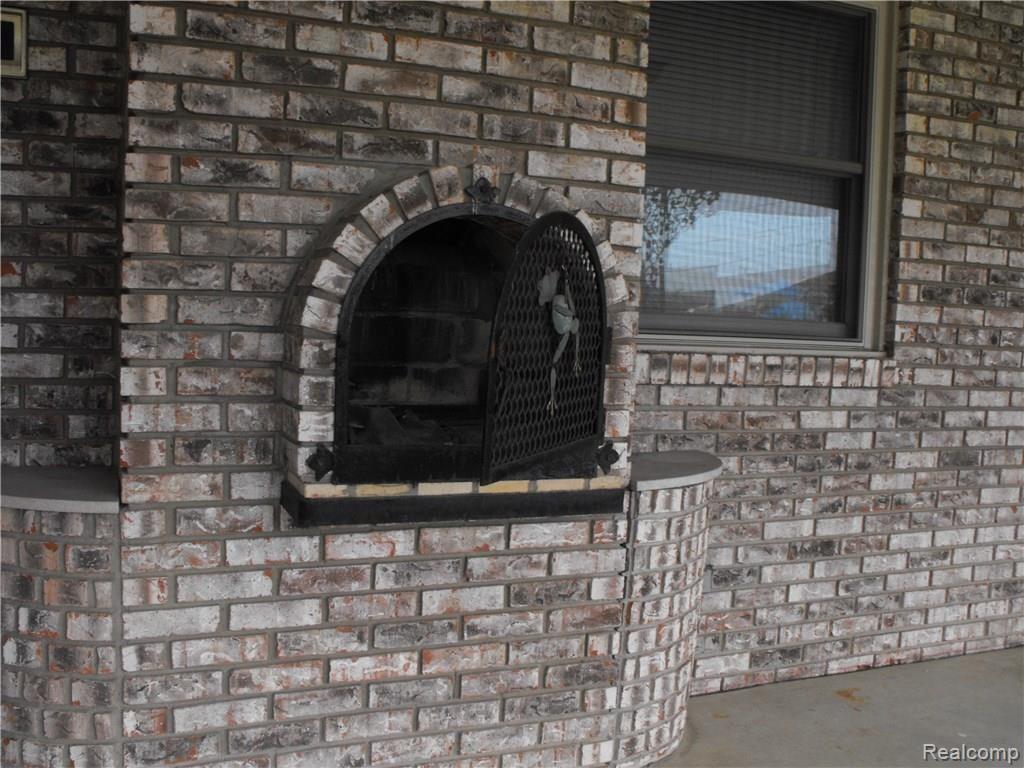 3600 Leason Road Sterling Heights, MI 48310 - Photo 58 of 60 Rear porch brickoven 1.JPG