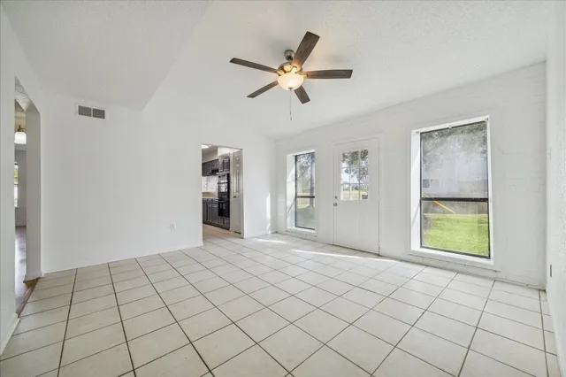 a view of an empty room and window