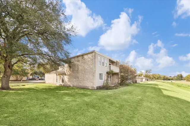 a front view of house with yard