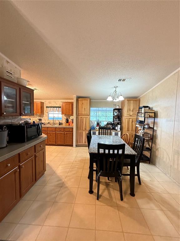 5109 Southwest 10th Street Bell, FL 32619 - Photo 22 of 38 a view of a dining room with furniture