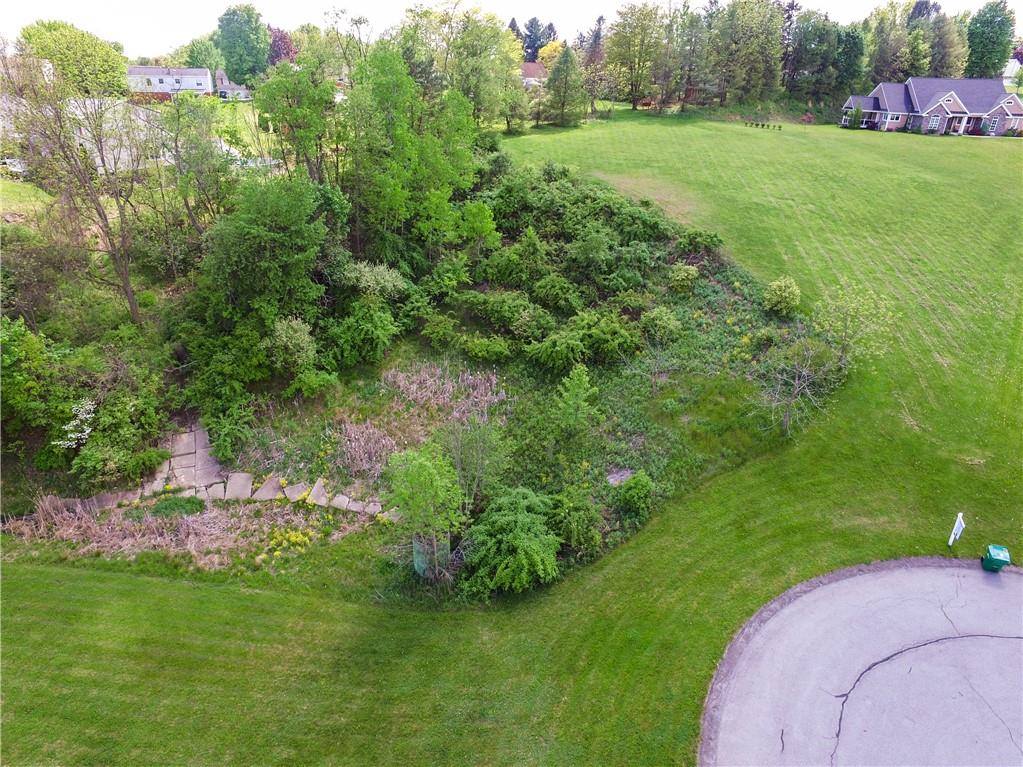 Lot 3 Candleford Court Butler, PA 16001 - Photo 7 of 15 a view of a garden with a building in the background
