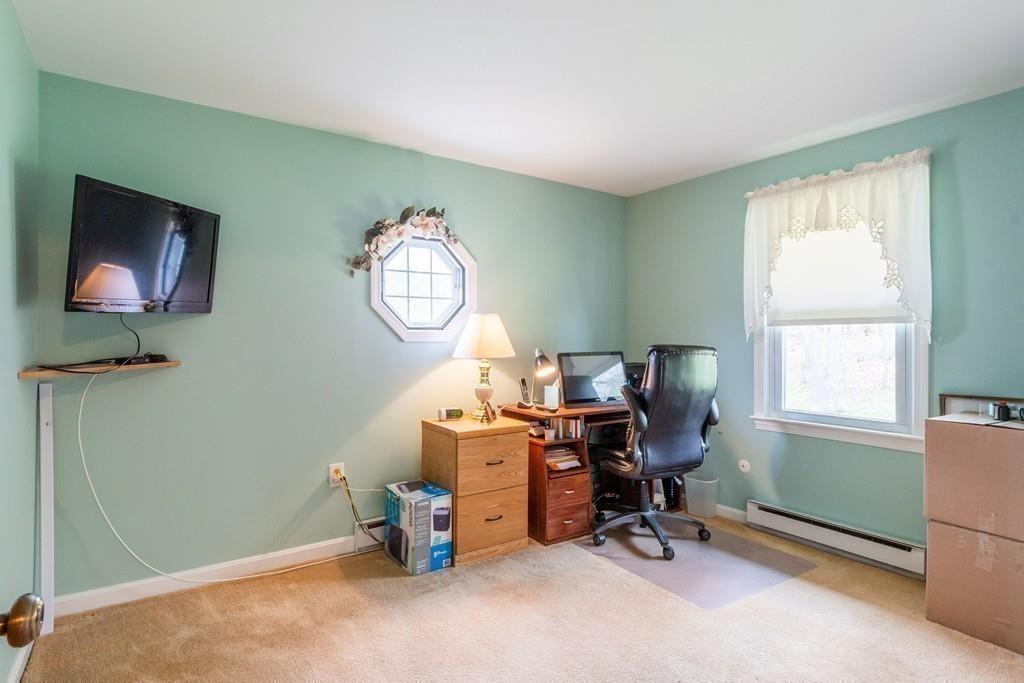 2 Old County Road Pelham, NH 03076 - Photo 15 of 38 a view of a workspace with furniture and a window