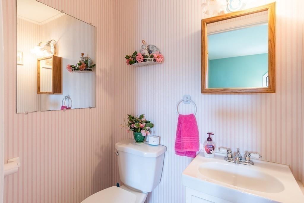 2 Old County Road Pelham, NH 03076 - Photo 16 of 38 a bathroom with a sink mirror and toilet