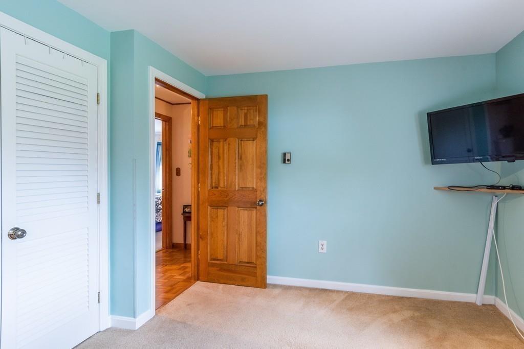 2 Old County Road Pelham, NH 03076 - Photo 17 of 38 a view of a room with sliding door and wooden floor