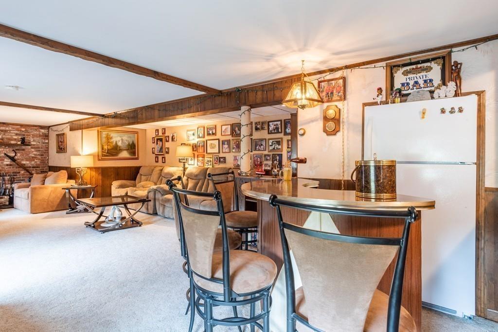 2 Old County Road Pelham, NH 03076 - Photo 24 of 38 a dining room with furniture and a large window