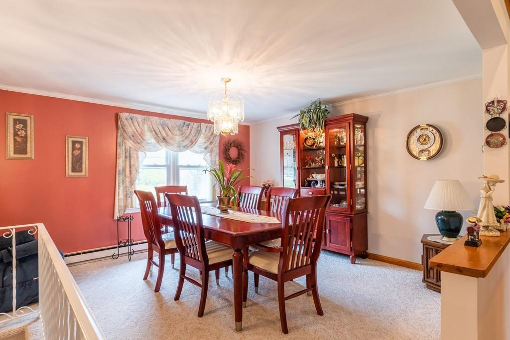 2 Old County Road Pelham, NH 03076 - Photo 7 of 38 a view of a dining room with furniture and chandelier