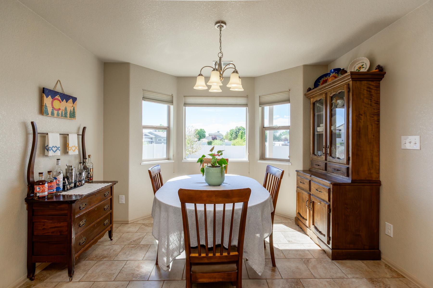 103 Red Rocks Street Fruita, CO 81521 - Photo 31 of 39 a dining room with furniture and window