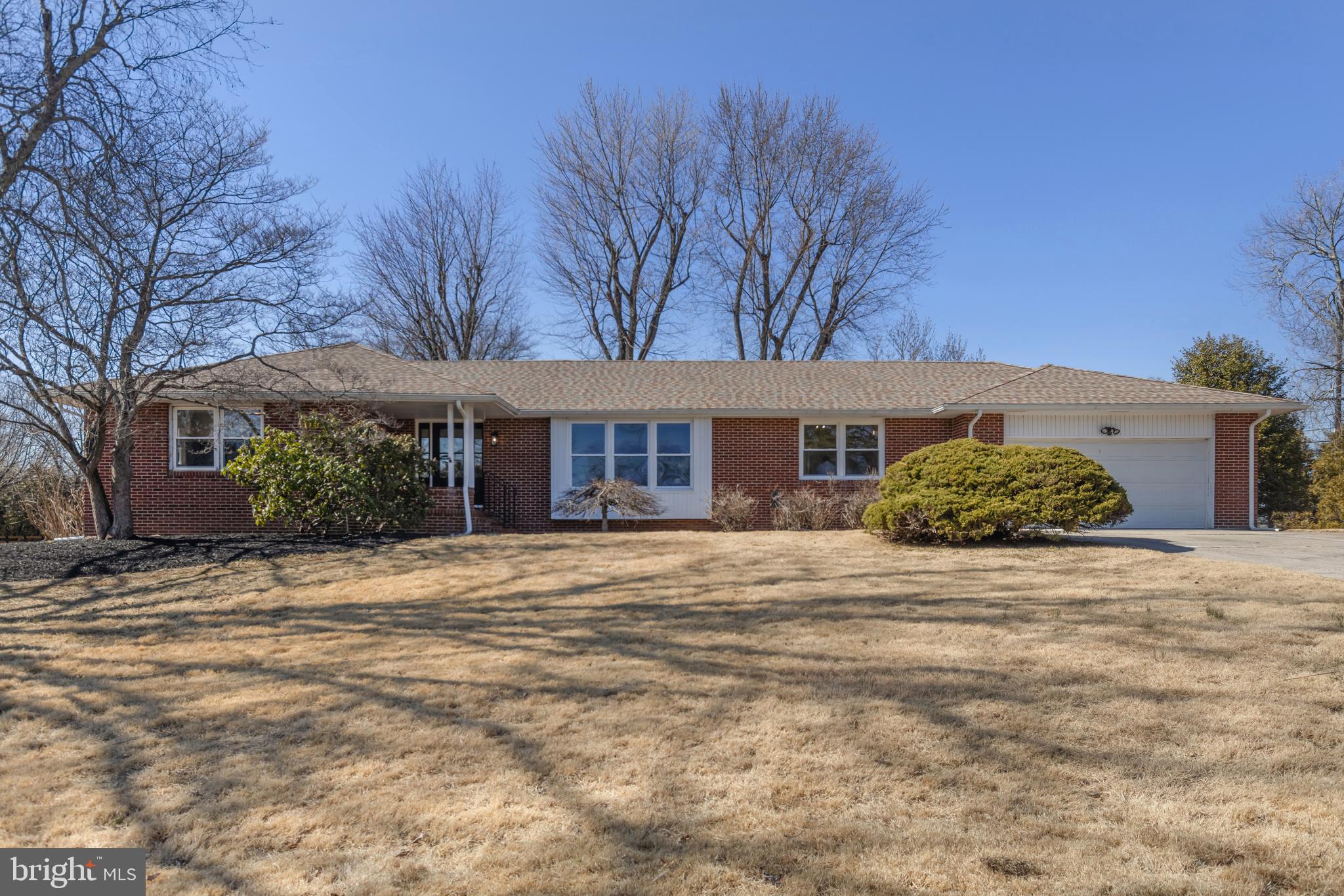 7 Maple Road Eastampton, NJ 08060 - Photo 1 of 62 a front view of a house with a yard and garage
