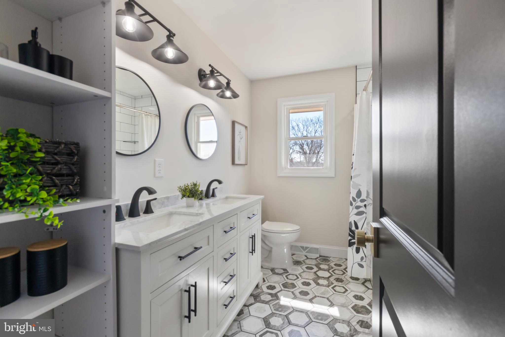 7 Maple Road Eastampton, NJ 08060 - Photo 39 of 62 a bathroom with a toilet sink and mirror